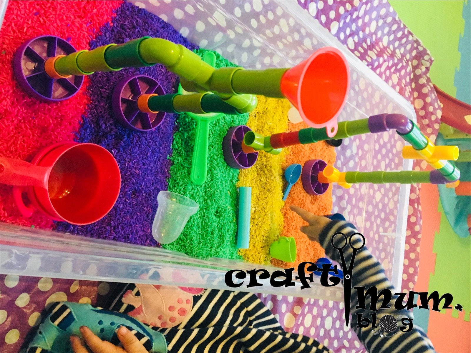 Pipes & rainbow rice play